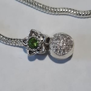 Bright green star charm